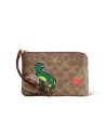 กระเป๋าสตางค์ COACH CW856 CORNER ZIP WRISTLET IN SIGNATURE CANVAS WITH STICKER PRINT (IMTAM)				