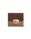 กระเป๋าสตางค์ COACH CW801 ELIZA SMALL WALLET IN SIGNATURE CANVAS  (IMXHE)				