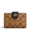 กระเป๋าสตางค์ COACH C0082 MEDIUM CORNER ZIP WALLET IN SIGNATURE CANVAS (IMCBI)