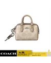 พวงกุญแจ COACH CX068 MINI ROWAN BAG CHARM IN SIGNATURE CANVAS (SVPWH)